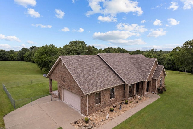5651 State Highway 125 S, Sparta, MO 65753 - view of front facade featuring concrete driveway, brick siding, a garage, and roof with shingles