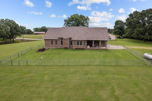 5651 State Highway 125 S, Sparta, MO 65753 - back of property featuring brick siding, a patio area, a view of countryside, and a shingled roof