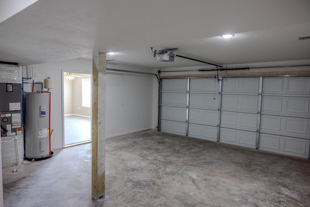 garage featuring water heater and a garage door opener