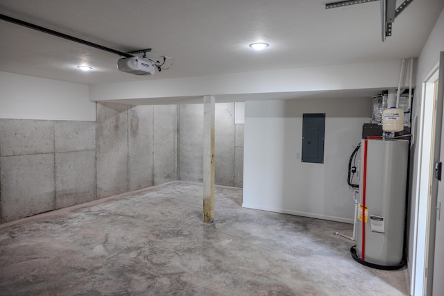 basement with water heater, a garage, and electric panel