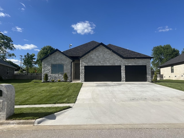 1293 W Gaslight Dr, Springfield, MO 65810 - view of front of house featuring a garage, a front yard, driveway, and stone siding