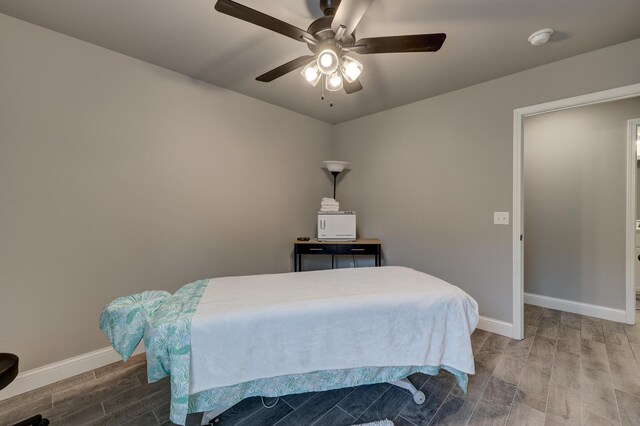 1859 Boyer Pl, Webb City, MO 64870 - bedroom featuring baseboards, ceiling fan, and wood tiled floor
