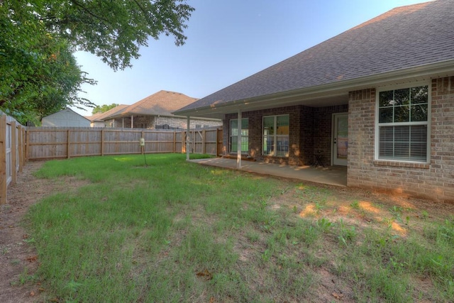 1859 Boyer Pl, Webb City, MO 64870 - view of yard featuring a fenced backyard and a patio