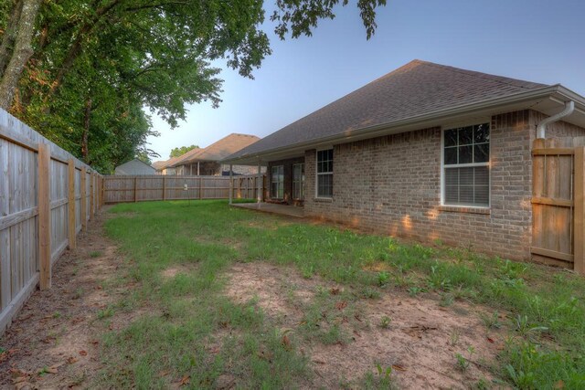1859 Boyer Pl, Webb City, MO 64870 - view of yard with a fenced backyard