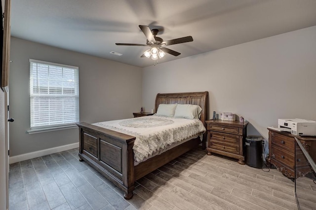 1859 Boyer Pl, Webb City, MO 64870 - bedroom with baseboards, ceiling fan, and light wood-type flooring