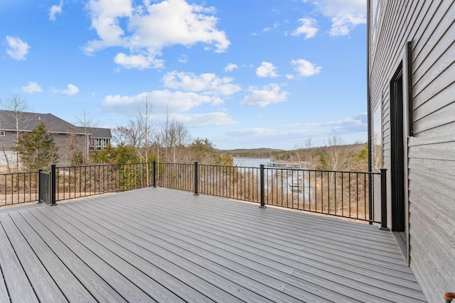 wooden terrace with a water view