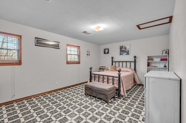 2505 Courtney Pl, West Plains, MO 65775 - bedroom with a textured ceiling and baseboards