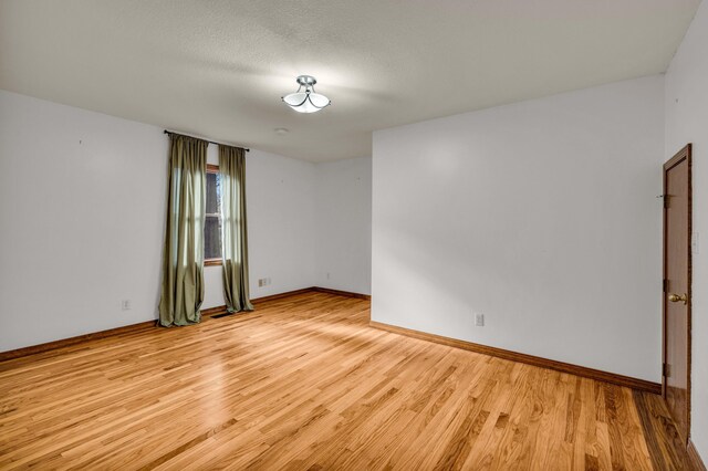 2505 Courtney Pl, West Plains, MO 65775 - empty room featuring light wood-type flooring and baseboards