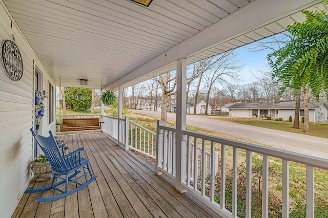 2505 Courtney Pl, West Plains, MO 65775 - deck with covered porch and a residential view