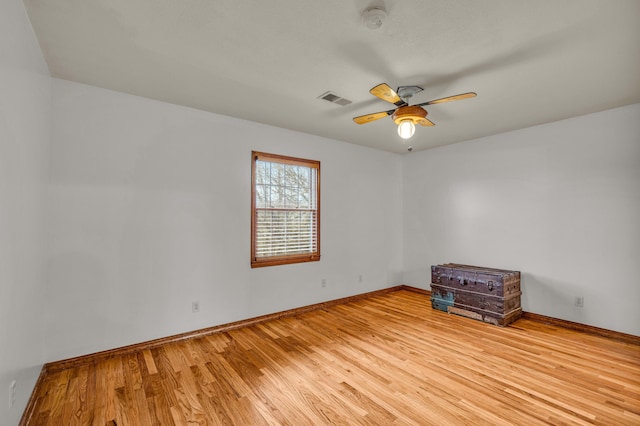 2505 Courtney Pl, West Plains, MO 65775 - empty room featuring wood finished floors, ceiling fan, baseboards, and a smoke detector