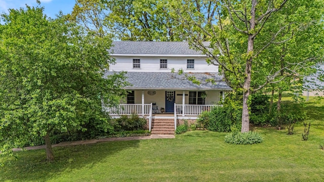 2505 Courtney Pl, West Plains, MO 65775 - view of front of home featuring covered porch, a shingled roof, and a front yard