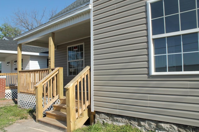 423 W Division St, Springfield, MO 65803 - property entrance featuring roof with shingles