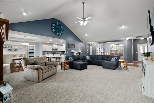 445 E Sequoia St, Republic, MO 65738 - living room with a chandelier, ceiling fan, carpet floors, high vaulted ceiling, and recessed lighting
