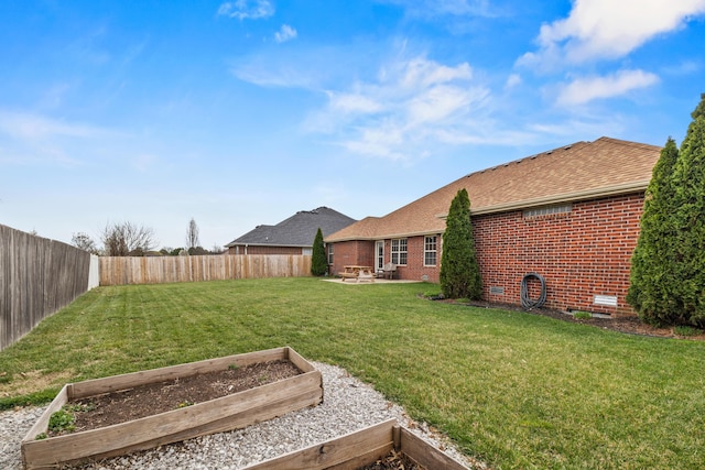 445 E Sequoia St, Republic, MO 65738 - view of yard featuring a vegetable garden and a patio