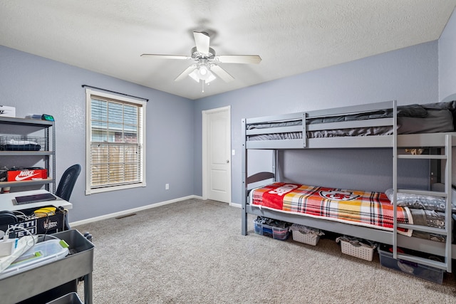 445 E Sequoia St, Republic, MO 65738 - carpeted bedroom with baseboards, a textured ceiling, and ceiling fan