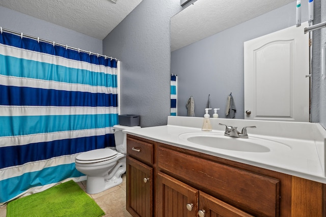 445 E Sequoia St, Republic, MO 65738 - bathroom featuring vanity, toilet, a textured ceiling, tile patterned floors, and a shower with curtain