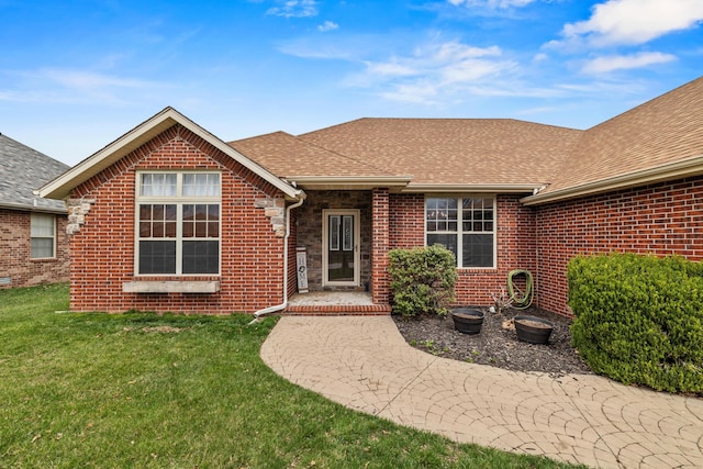 445 E Sequoia St, Republic, MO 65738 - rear view of house with a yard, a shingled roof, and brick siding