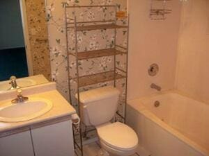 120 Spring Creek Ct Unit B1-U34, Branson, MO 65616 - full bathroom featuring toilet, vanity, and shower / tub combination