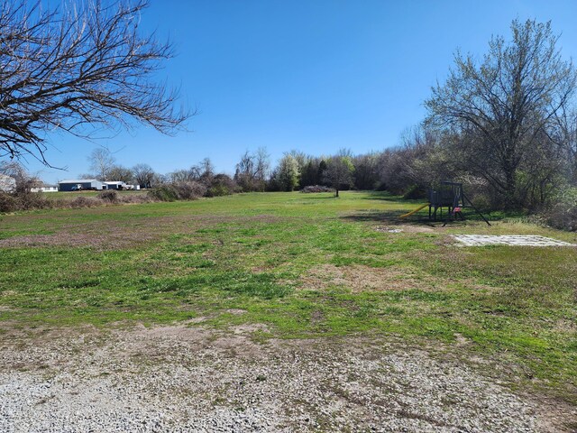 view of yard with a playground