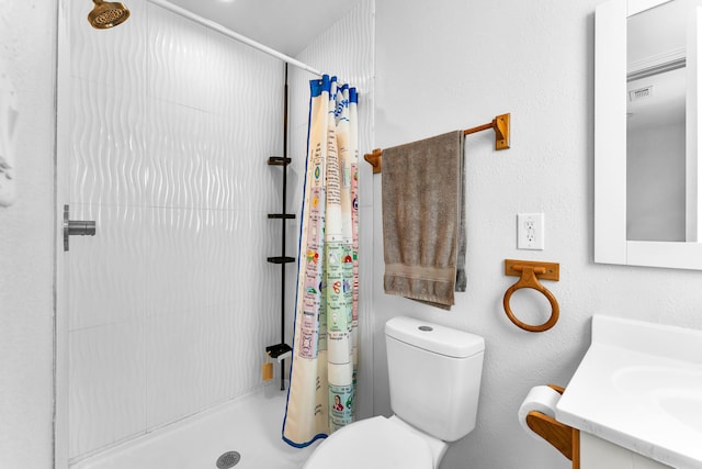 504 Brown St, Branson, MO 65616 - full bathroom with a stall shower, toilet, and vanity