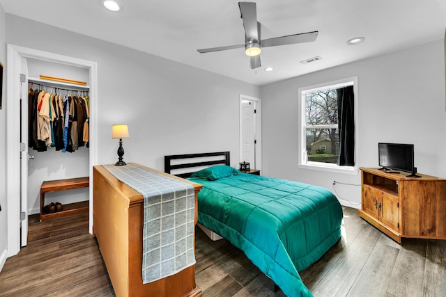 504 Brown St, Branson, MO 65616 - bedroom with baseboards, wood finished floors, recessed lighting, and a spacious closet