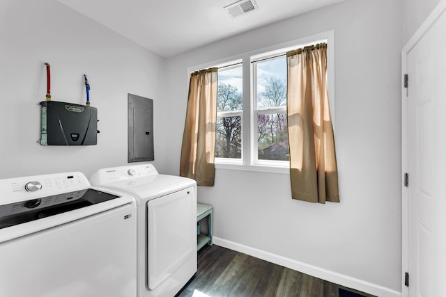 504 Brown St, Branson, MO 65616 - clothes washing area featuring washing machine and dryer, electric panel, dark wood-style floors, and baseboards