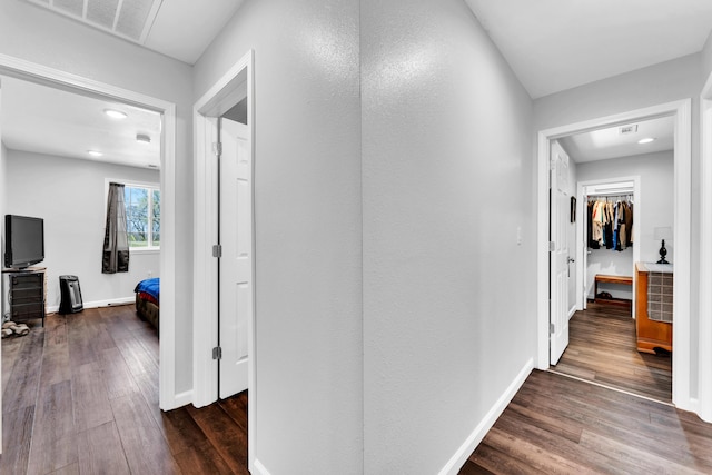 504 Brown St, Branson, MO 65616 - hall with dark wood finished floors, baseboards, and recessed lighting