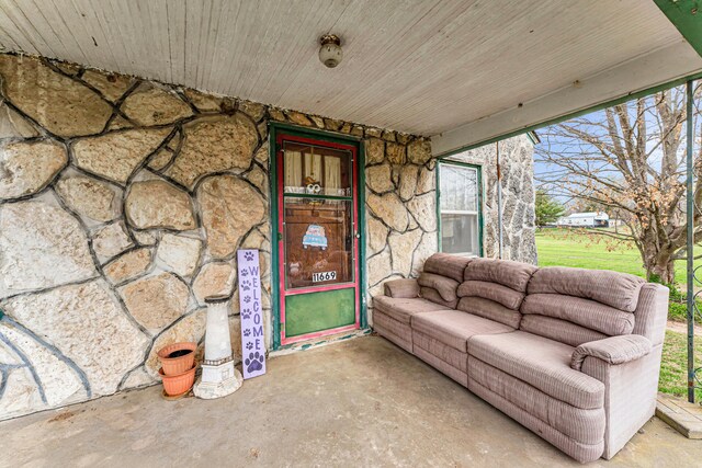 sunroom / solarium with an outdoor living space