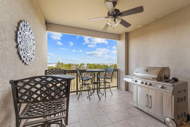 view of patio / terrace featuring grilling area, ceiling fan, and outdoor dining space