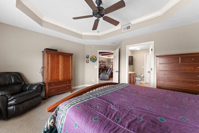 bedroom featuring crown molding, light colored carpet, baseboards, a raised ceiling, and visible vents
