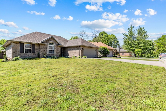 3500 W Sagamont St, Springfield, MO 65807 - ranch-style house featuring concrete driveway, an attached garage, brick siding, and a front yard