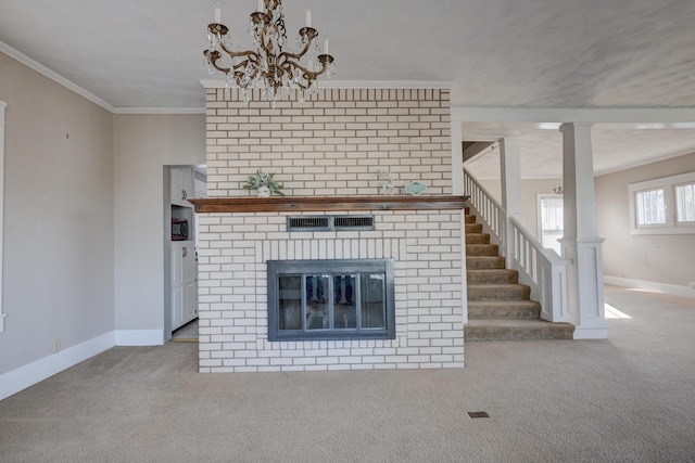 unfurnished living room featuring baseboards, carpet floors, and ornamental molding