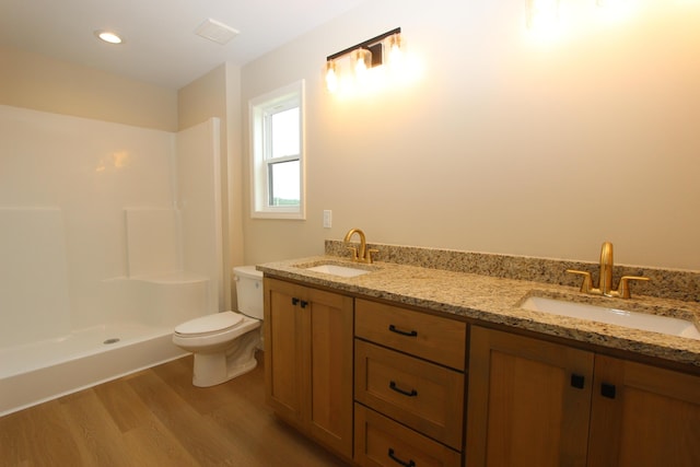 LOT1 Arden Rdg, Ava, MO 65608 - full bathroom with wood finished floors, toilet, double vanity, and a shower