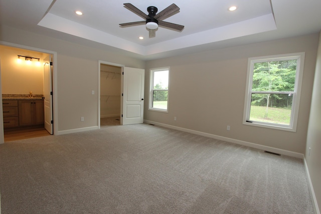LOT1 Arden Rdg, Ava, MO 65608 - unfurnished bedroom with a raised ceiling, baseboards, recessed lighting, light colored carpet, and a sink