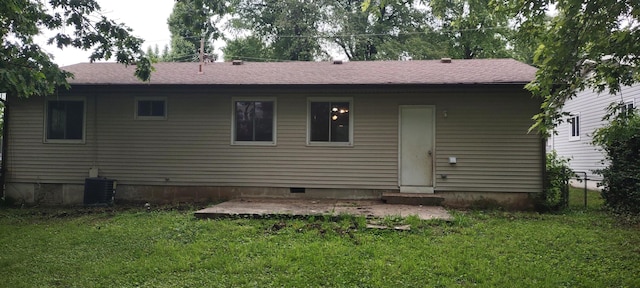 1022 E Mccanse St, Springfield, MO 65803 - rear view of house with a lawn, crawl space, and a shingled roof