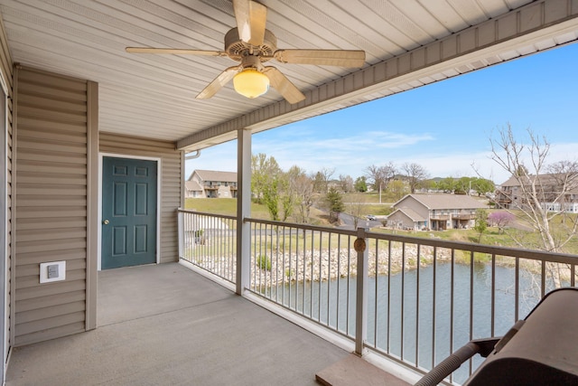 34 Golf Shrs Unit 26, Branson, MO 65616 - balcony featuring a residential view, a water view, and ceiling fan