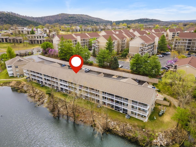 34 Golf Shrs Unit 26, Branson, MO 65616 - drone / aerial view featuring a residential view and a water and mountain view
