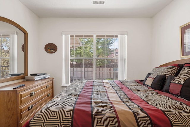 34 Golf Shrs Unit 26, Branson, MO 65616 - bedroom featuring arched walkways and visible vents