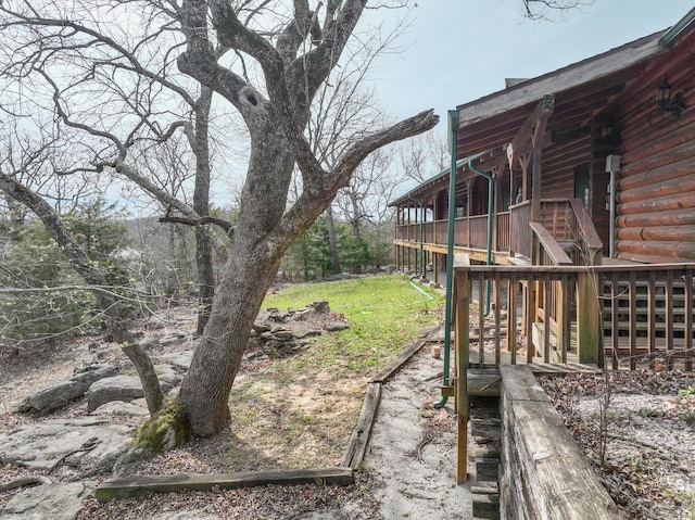 view of yard featuring a deck