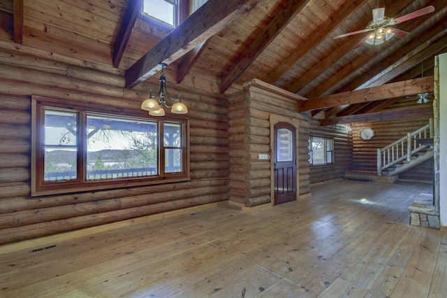 interior space with visible vents, beamed ceiling, ceiling fan, hardwood / wood-style floors, and wooden ceiling