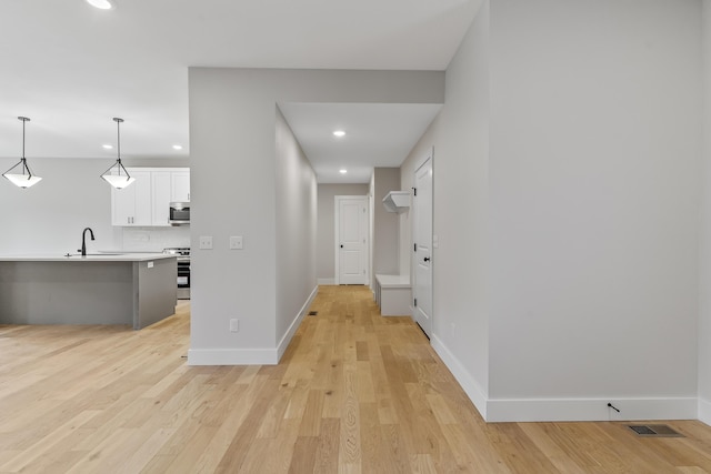 2117 N Silver Charm Ave, Springfield, MO 65802 - hall featuring recessed lighting and light wood finished floors
