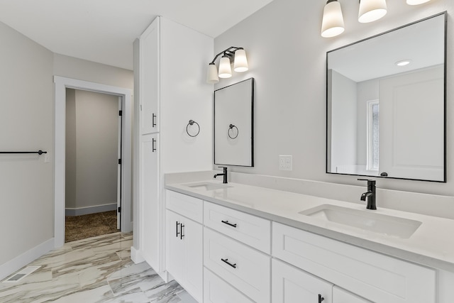 2117 N Silver Charm Ave, Springfield, MO 65802 - bathroom with double vanity and marble look tile flooring