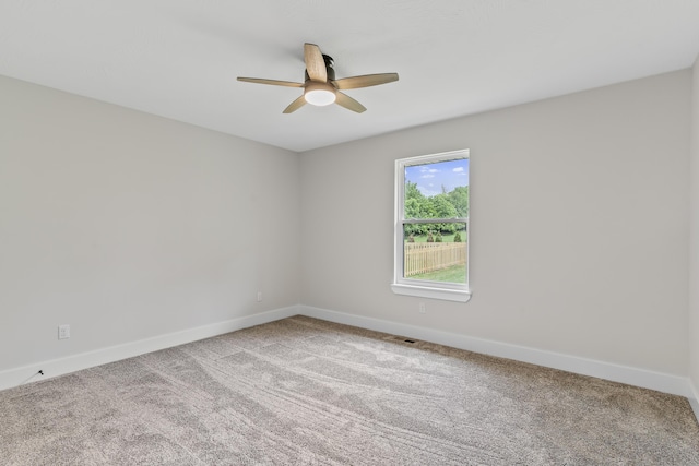 2117 N Silver Charm Ave, Springfield, MO 65802 - empty room with ceiling fan and carpet