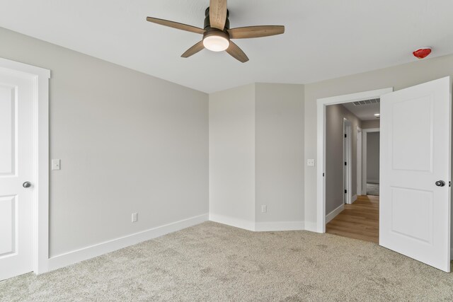 2117 N Silver Charm Ave, Springfield, MO 65802 - empty room featuring ceiling fan and carpet