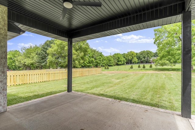 2117 N Silver Charm Ave, Springfield, MO 65802 - view of patio / terrace with a ceiling fan and view of wooded area