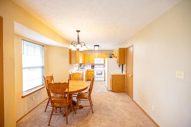 919 S Central Ave, Marionville, MO 65705 - dining space featuring an inviting chandelier, light carpet, baseboards, and a textured ceiling