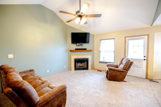 919 S Central Ave, Marionville, MO 65705 - carpeted living room featuring baseboards, ceiling fan, a tile fireplace, and vaulted ceiling