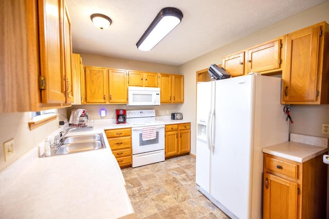 919 S Central Ave, Marionville, MO 65705 - kitchen featuring stone finish floor, white appliances, light countertops, and a sink