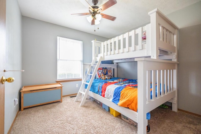 919 S Central Ave, Marionville, MO 65705 - carpeted bedroom with a textured ceiling, baseboards, and ceiling fan