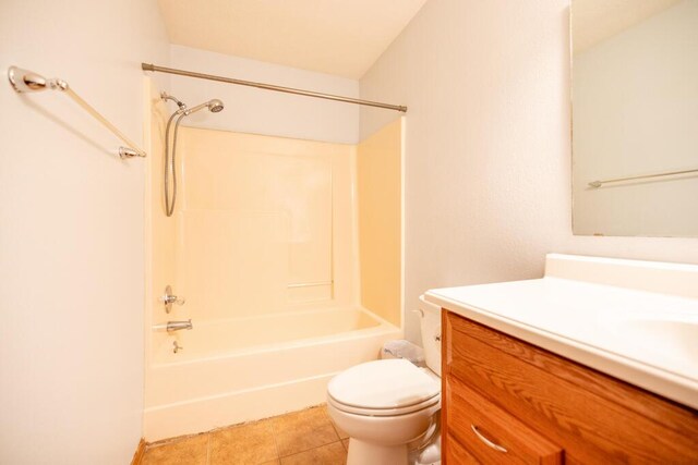 919 S Central Ave, Marionville, MO 65705 - full bathroom with washtub / shower combination, tile patterned floors, toilet, and vanity